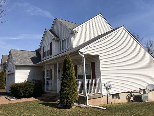 Gilbertsville, Pennsylvania house with repaired siding